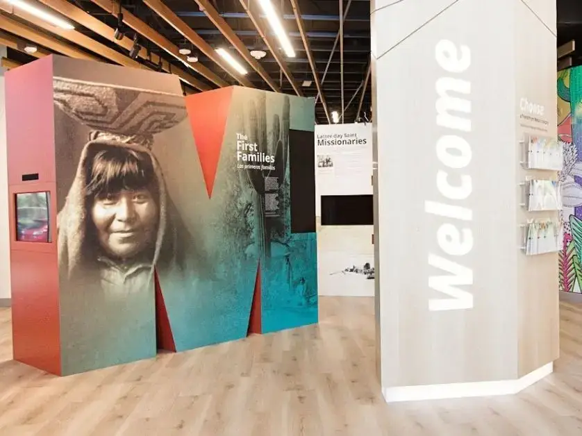 An "M" sign and column that says "Welcome" in the interior of the Mesa Temple Visitors' Center